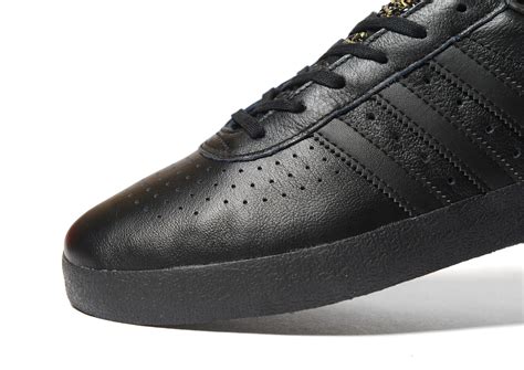 women's black leather adidas sneakers.